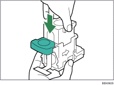 Illustration af hæftepatron