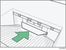 Illustration du r&eacute;ceptacle sup&eacute;rieur du finisseur