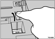 Illustration de la molette de réglage fin du magasin latéral