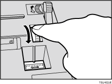 Illustration de la molette de réglage fin du magasin latéral