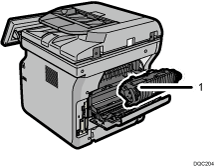 Ilustracja wnętrza urządzenia z numerowanymi odnośnikami